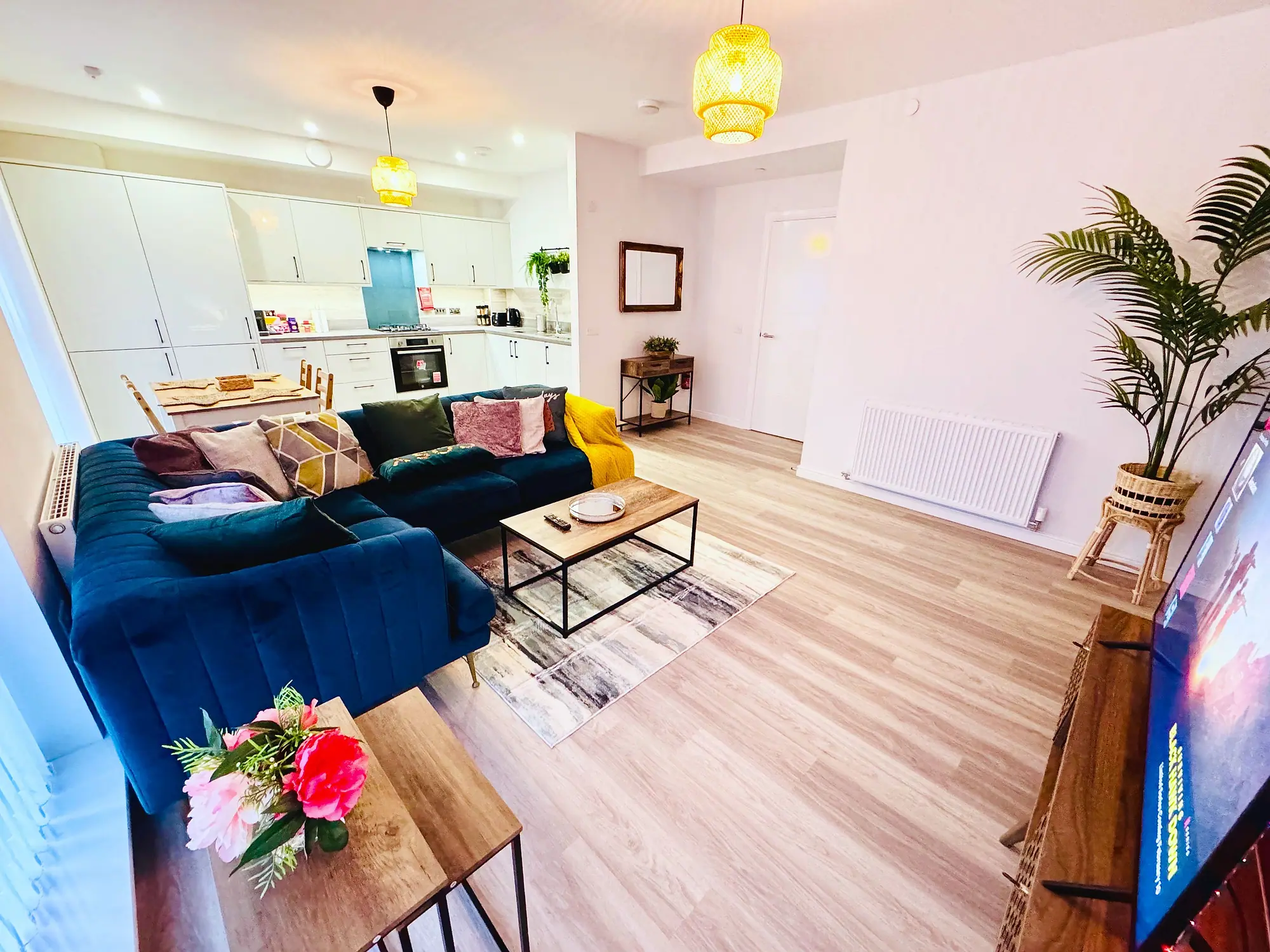 Living room looking through to the open-plan kitchen
